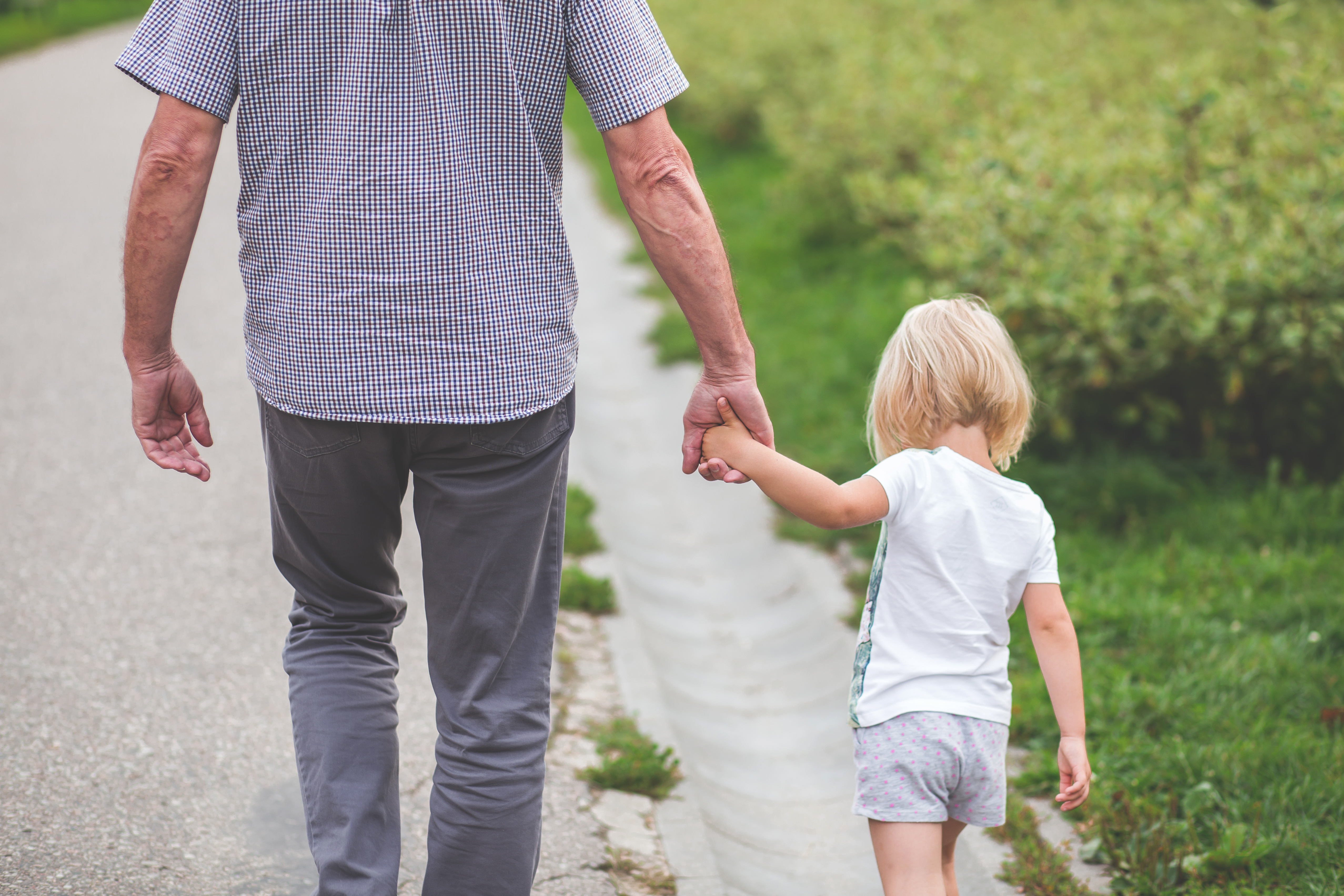 Grandpa walking with granddaughter